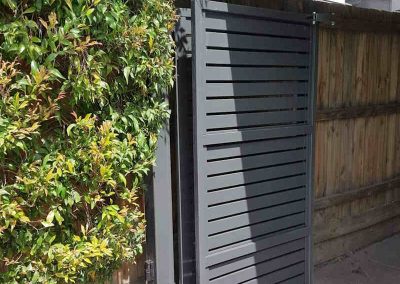 Trackless bi-fold Gates Bundoora Carport Case Study